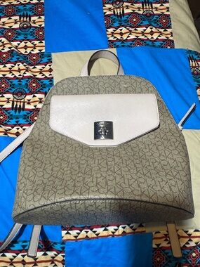 Calvin KleinDesigner  Beige Monogram Backpack with Cream Flap